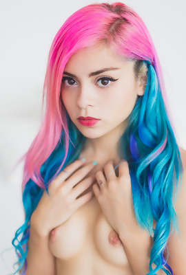 Another colorful girl posing naked in her bedroom